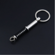 Load image into Gallery viewer, Shock Absorber Spring Black or Red Keyring

